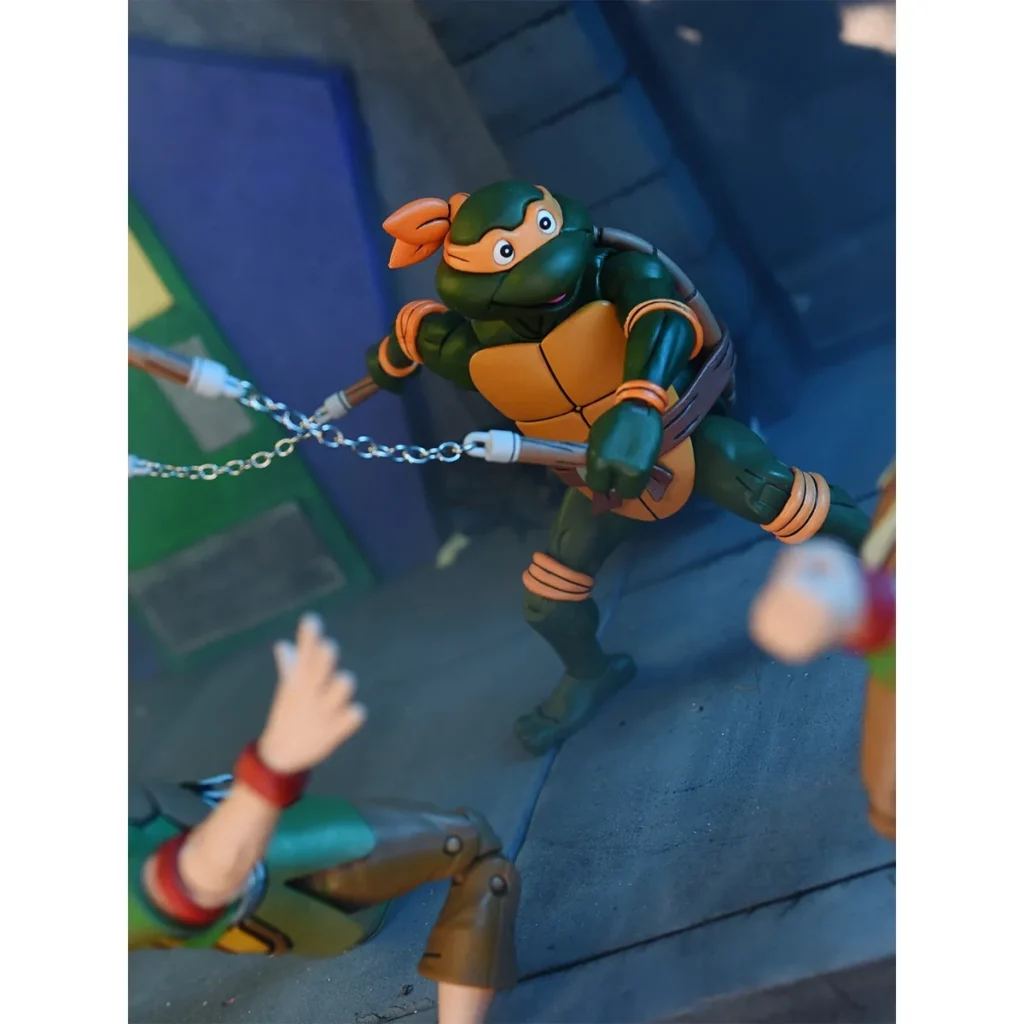 02. NECA Teenage Mutant Ninja Turtles Michelangelo (Cartoon) Figura, 18cm