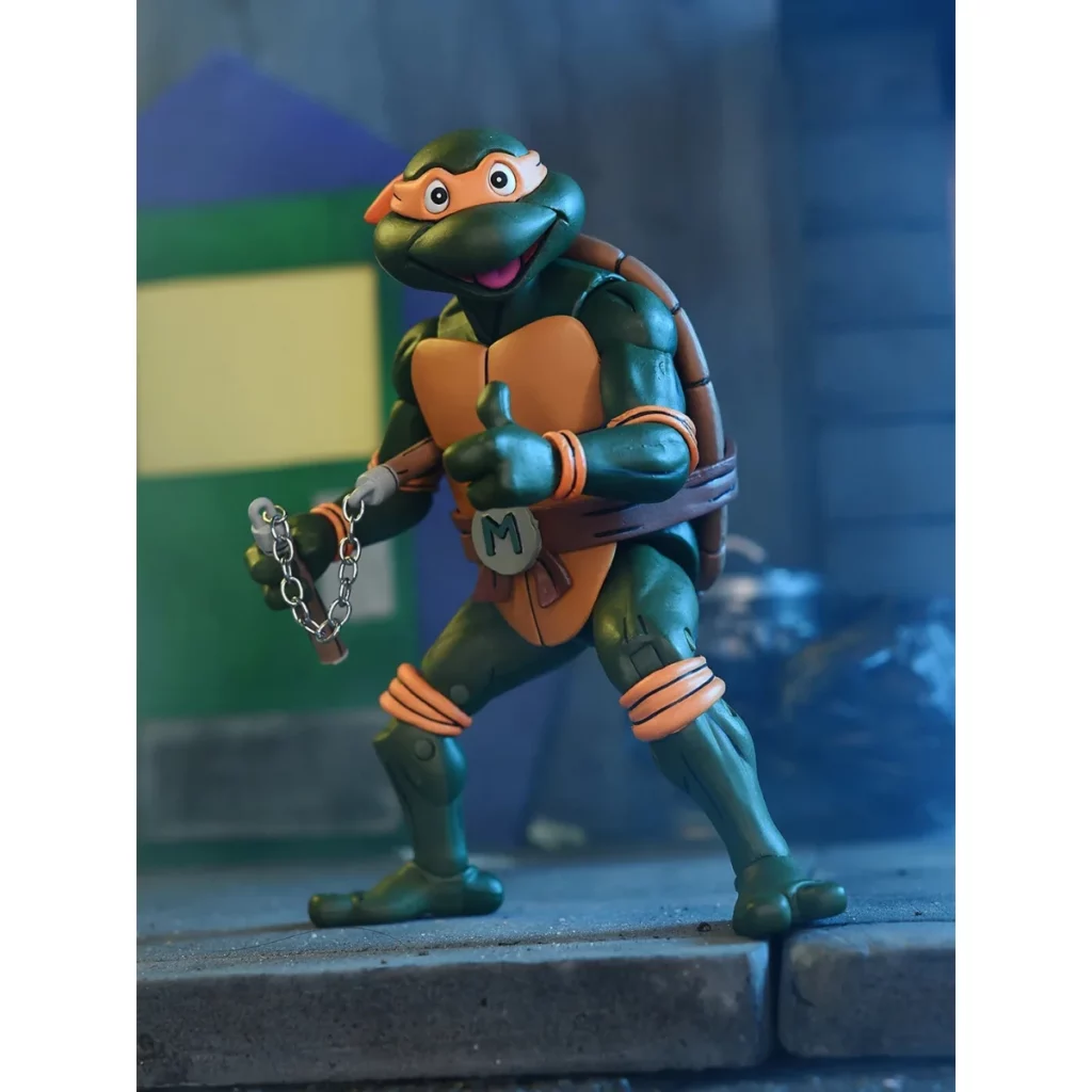 04. NECA Teenage Mutant Ninja Turtles Michelangelo (Cartoon) Figura, 18cm