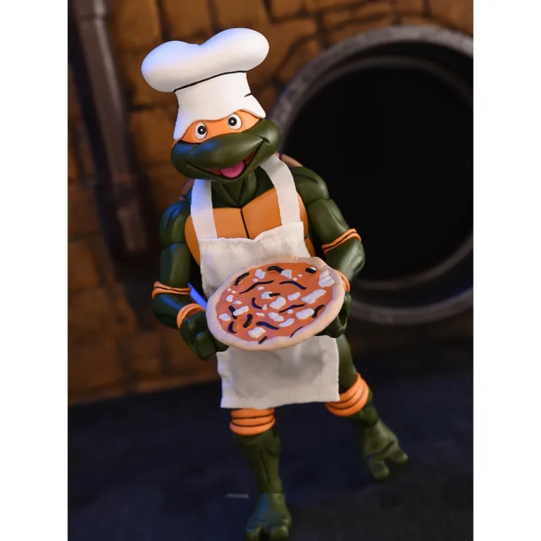 05. NECA Teenage Mutant Ninja Turtles Michelangelo (Cartoon) Figura, 18cm