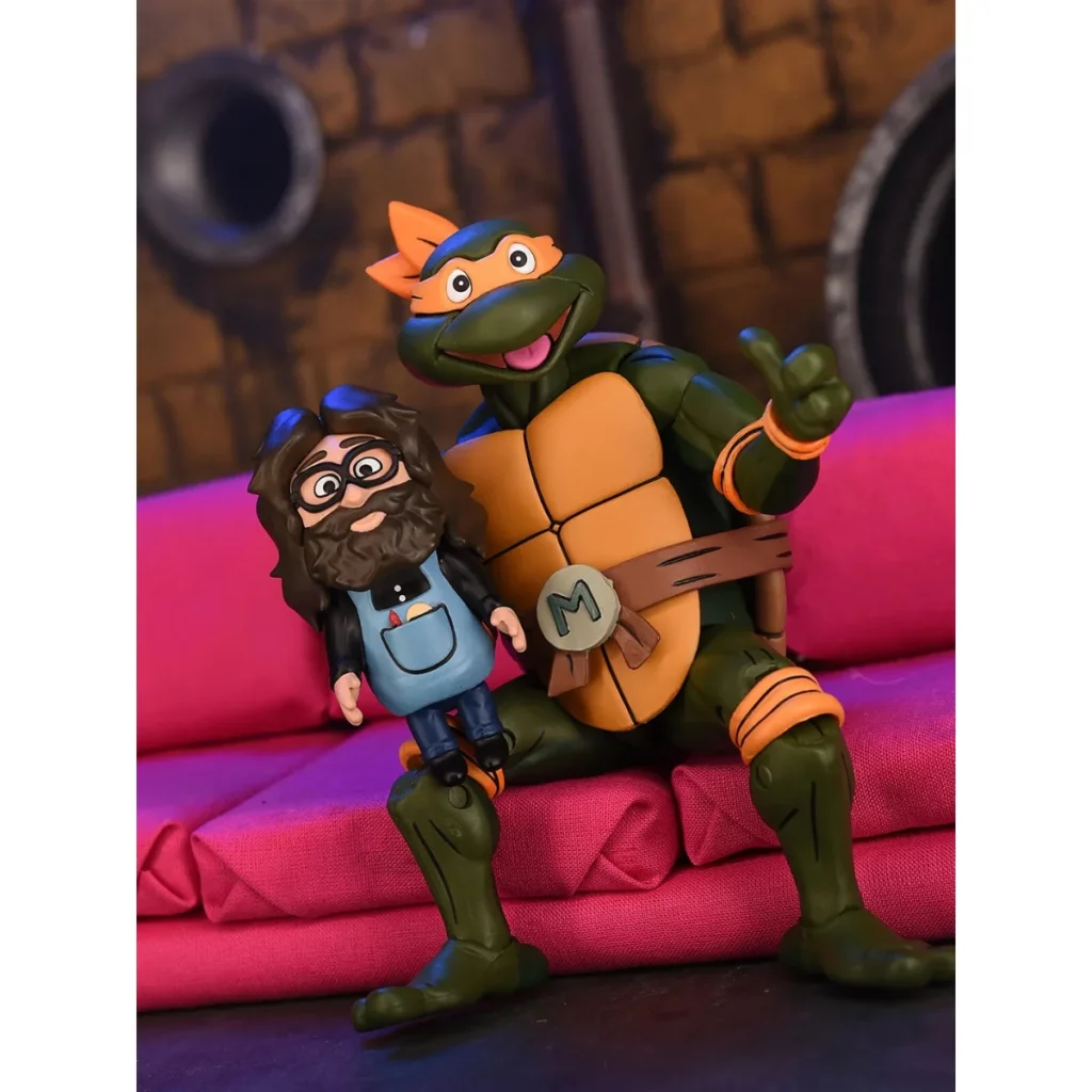 06. NECA Teenage Mutant Ninja Turtles Michelangelo (Cartoon) Figura, 18cm