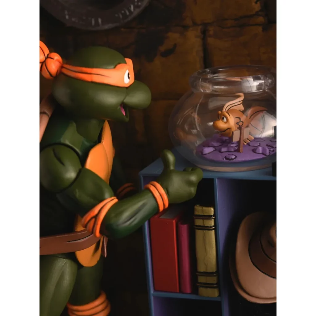 07. NECA Teenage Mutant Ninja Turtles Michelangelo (Cartoon) Figura, 18cm